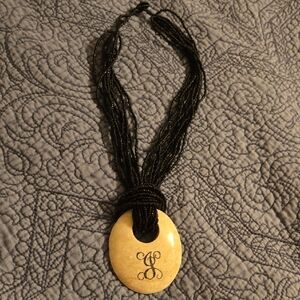 Black Beaded Necklace with a Stone Pendant- J Monogram